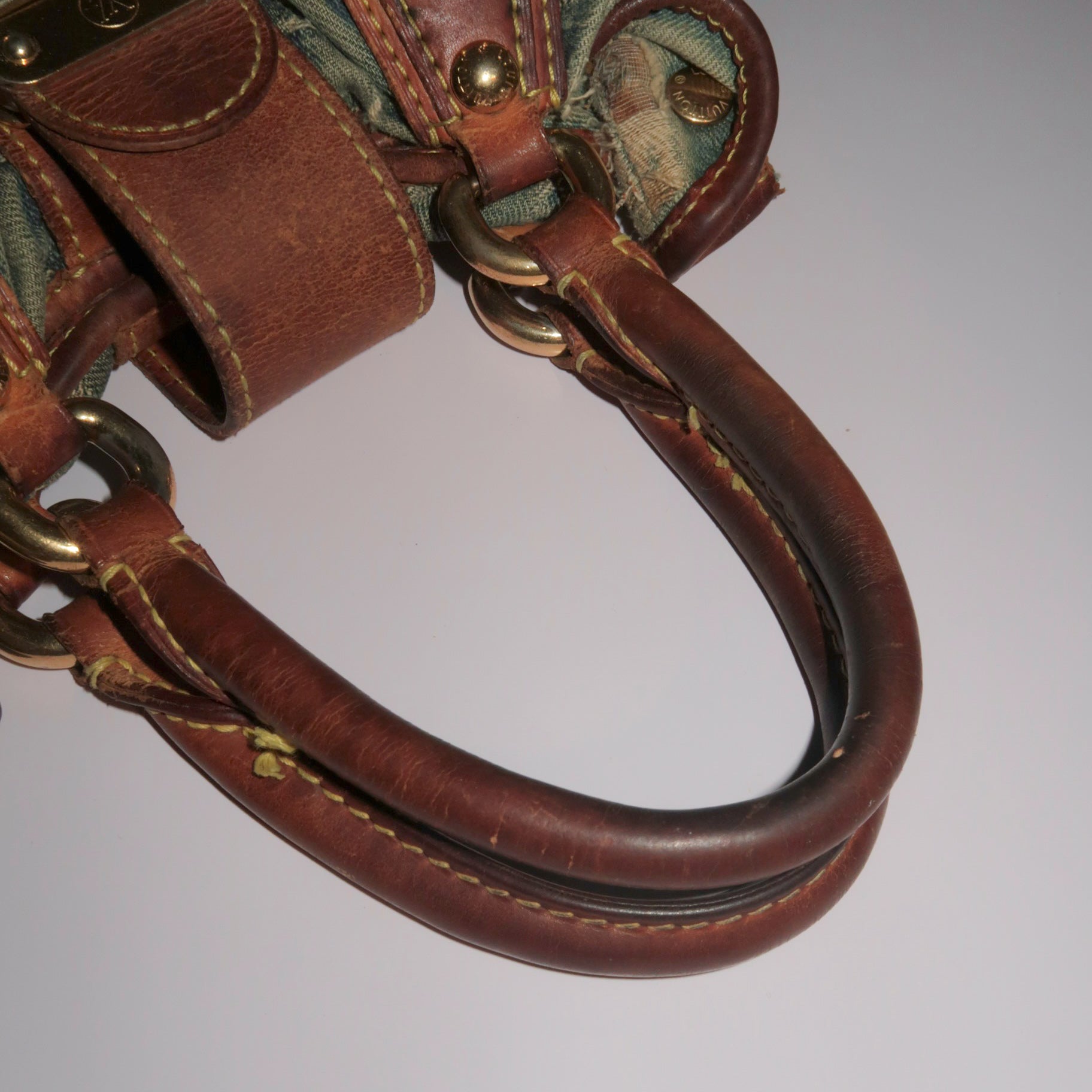 Louis Vuitton Monogram Denim Pleaty Mini Handbag