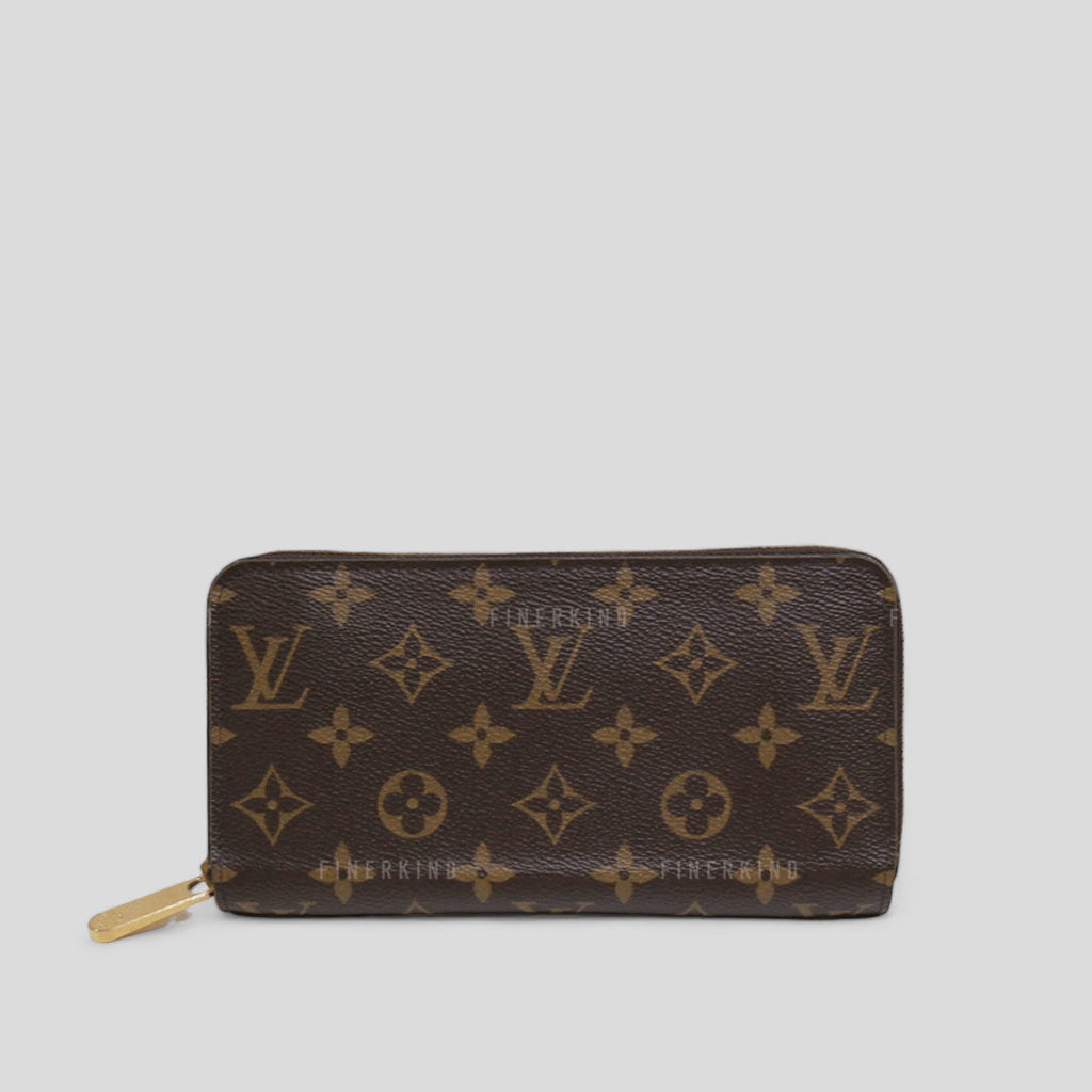 Louis Vuitton Monogram Long Zippy Wallet in Fuschia